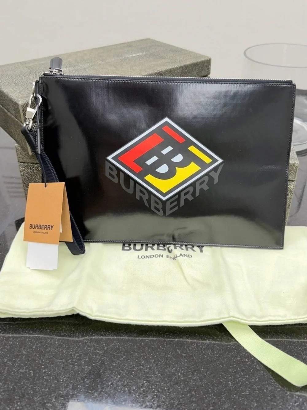 Burberry Black Gloss Leather Wristlet Pouch with Multicolor Logo